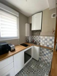 Appartements Le Cosy : photos des chambres
