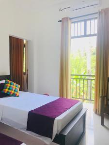 Sri White Villa Airport Boutique Hotel