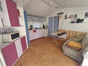 Chalets Mobil home Climatise 4-6 personnes : photos des chambres