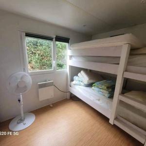 Chalets Mobil home Climatise 4-6 personnes : photos des chambres