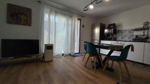 Appartements Appartement avec terrasse dans maison individuelle : photos des chambres