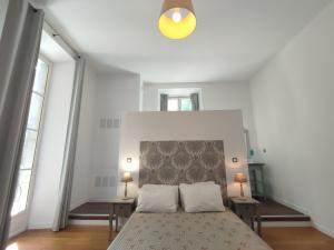 Appartements Suite de Reve au Chateau avec Bain Cache - Acces Bassin de Nage - Clim : photos des chambres