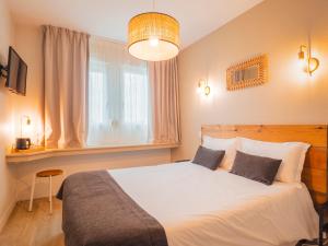 Hotels Hotel La Licorne : photos des chambres
