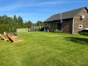 Mazury Dom Oluś nad jeziorem Sasek Wielki z gorącą balia z funkcją jakuzzi