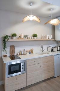 Appartements Suite sensuelle et balneotherapie : photos des chambres