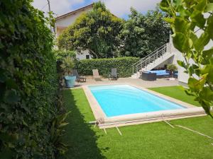 Villas Superbe maison avec piscine en centre ville : photos des chambres