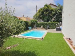 Villas Superbe maison avec piscine en centre ville : photos des chambres