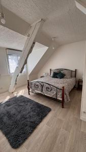 Maisons de vacances Petite maison de bourg : photos des chambres