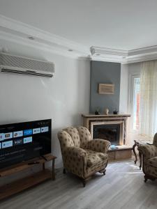 Five Bedroom Plus Living, Triplex Villa with Big Private Garden, Fifty Meters to Sea in Urla, Sleeps Twelve, Three Baths