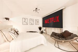 Appartements Studio Chic avec Cinema Prive A 15 min de Disneyland et 20 min de Paris : photos des chambres