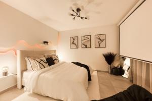 Appartements Studio Chic avec Cinema Prive A 15 min de Disneyland et 20 min de Paris : photos des chambres