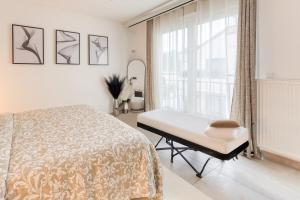 Appartements Studio Chic avec Cinema Prive A 15 min de Disneyland et 20 min de Paris : photos des chambres