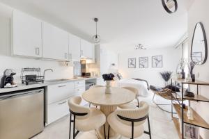 Appartements Studio Chic avec Cinema Prive A 15 min de Disneyland et 20 min de Paris : photos des chambres