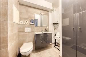Appartements Studio Chic avec Cinema Prive A 15 min de Disneyland et 20 min de Paris : photos des chambres