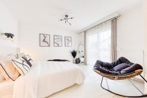 Appartements Studio Chic avec Cinema Prive A 15 min de Disneyland et 20 min de Paris : photos des chambres