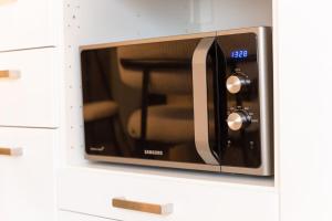 Appartements Studio Chic avec Cinema Prive A 15 min de Disneyland et 20 min de Paris : photos des chambres