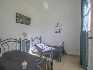 Maisons de vacances Spacious holiday home in Aure sur Mer with garden : photos des chambres