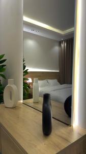 Studio with master bed and side seating