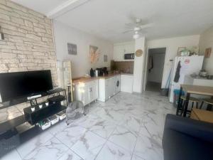 Appartements Evasion Soleil, Plage et Piscine : photos des chambres