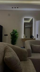 Studio with master bed and side seating