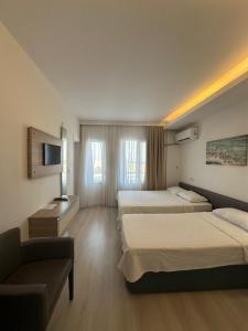 Standard Triple Room room in Amphora Hotel