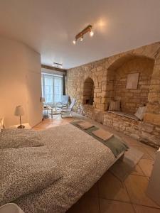 Maisons de vacances Petite maison au pied du chateau : photos des chambres