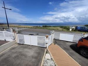 Vent dange maison familiale face à la mer