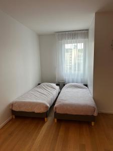 Appartements T2, balcon, centre et lac, garage, 73m2, calme chic : photos des chambres