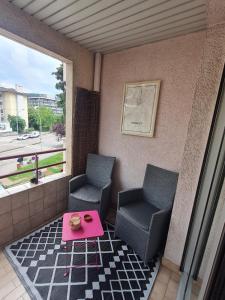 Appartements T2, balcon, centre et lac, garage, 73m2, calme chic : photos des chambres