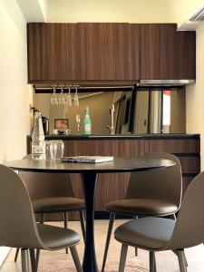 THE NIXON Luxury Suites and Apartment Hotel