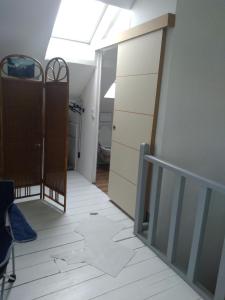 Sejours chez l'habitant Appartement dans une maison privee : photos des chambres