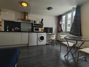 Appartements Les Ronchaux Studio Hyper Centre WiFi : photos des chambres