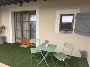 Maisons de vacances Entre parentheses : photos des chambres