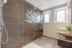 Appartements Le Lonsois - T3 lumineux avec exterieur : photos des chambres