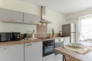 Appartements Le Lonsois - T3 lumineux avec exterieur : photos des chambres