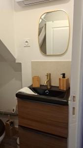 Appartements Charmant petit appartement avec terrasse : photos des chambres