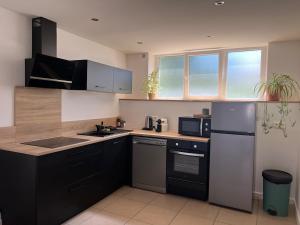 Appartements LE FAMILIAL 6 PERSONNES WIFi PARKING : photos des chambres