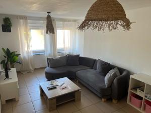 Appartements LE FAMILIAL 6 PERSONNES WIFi PARKING : photos des chambres