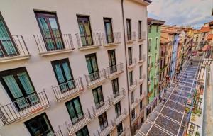 Experience the running of the bulls from your balcony