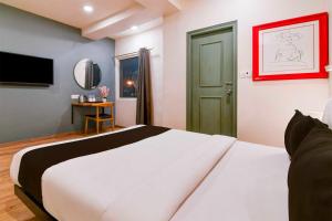 Townhouse Oak Kolkata Tegharia Bus Stand