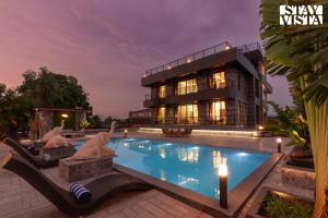 StayVista at Ashbourne Estate with AC, BBQ, Bonfire