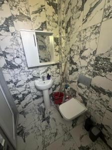 In the center, 6-7 minutes to the airport, close to the sea and coves