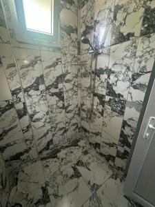 In the center, 6-7 minutes to the airport, close to the sea and coves