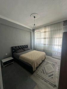 In the center, 6-7 minutes to the airport, close to the sea and coves