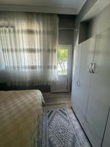 In the center, 6-7 minutes to the airport, close to the sea and coves