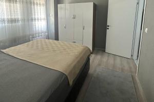 In the center, 6-7 minutes to the airport, close to the sea and coves