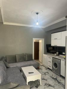 In the center, 6-7 minutes to the airport, close to the sea and coves