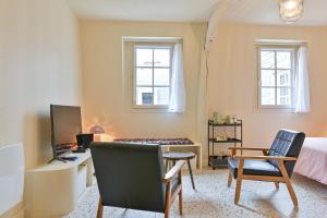 Appartements Studio quartier historique : photos des chambres