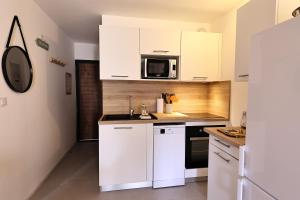 Appartements T2 elegant avec piscine chauffee & plage privee : photos des chambres