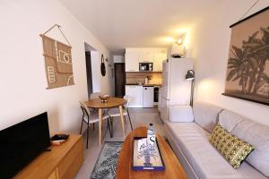 Appartements T2 elegant avec piscine chauffee & plage privee : photos des chambres